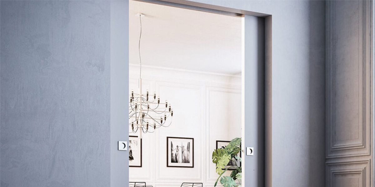 Розсувні двері, приховані у стіні